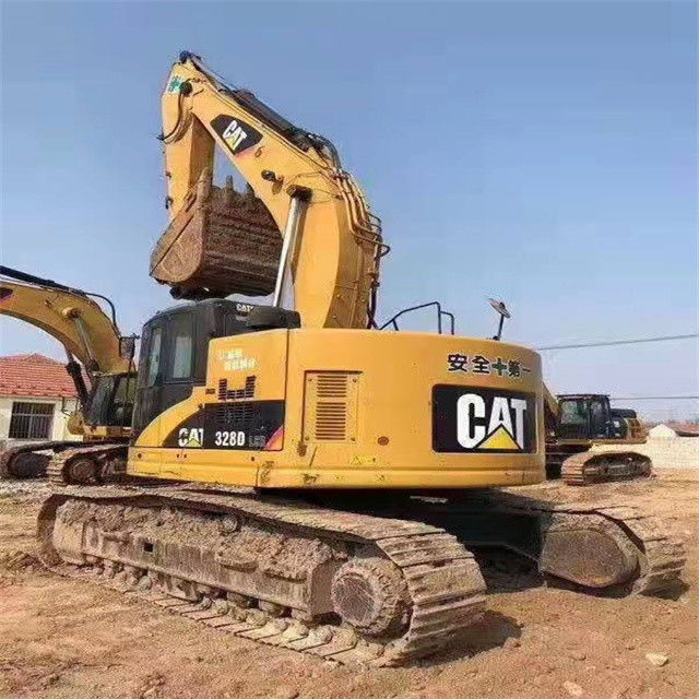 34.7 Tonnen, einsatzbereit und erfahren, gebraucht Japan Caterpillar 328 D in gutem Zustand.