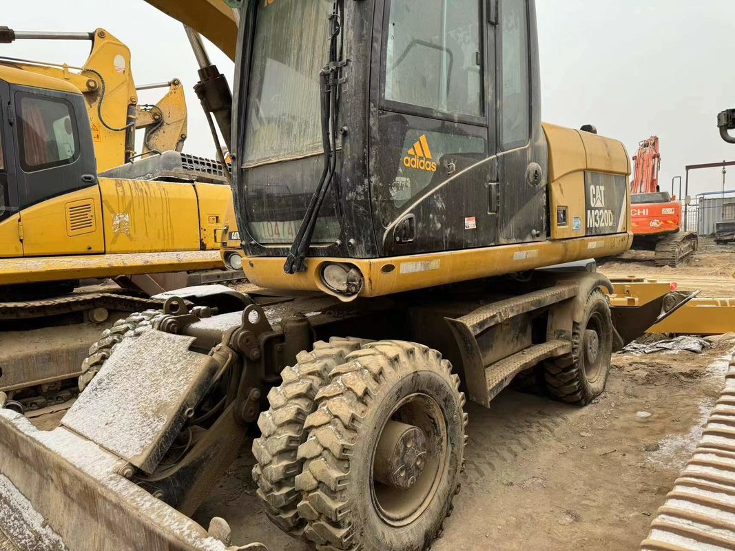 90% Caterpillar M317D2 Gebrauchtradbagger mit hoher Qualität und besten Leistungen zum Verkauf