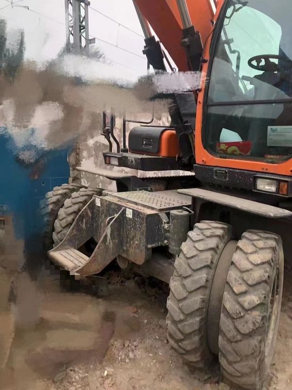 15 Tonnen Korea importiert 90% neue Doosan DX 140W Gebrauchtradbagger mit hoher Qualität und beste Leistung zum Verkauf