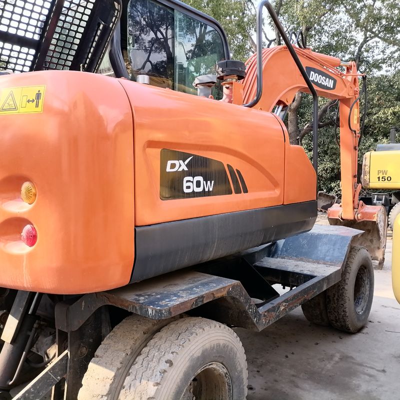 5 Tonnen Korea importiert 90% neue Doosan DX 60W Gebrauchtrad Bagger mit hoher Qualität und beste Leistung zum Verkauf
