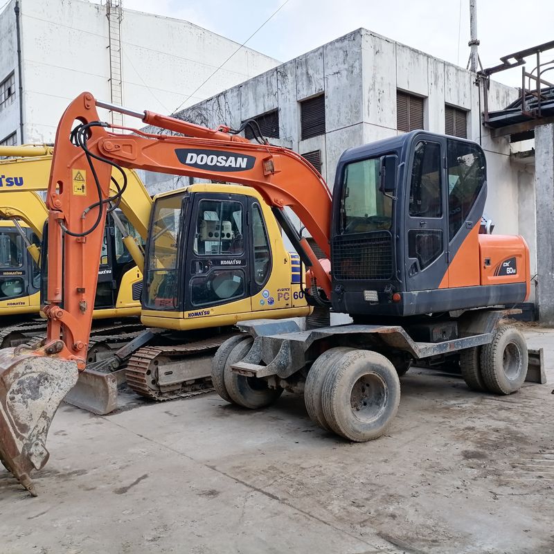 5 Tonnen Korea importiert 90% neue Doosan DX 60W Gebrauchtrad Bagger mit hoher Qualität und beste Leistung zum Verkauf